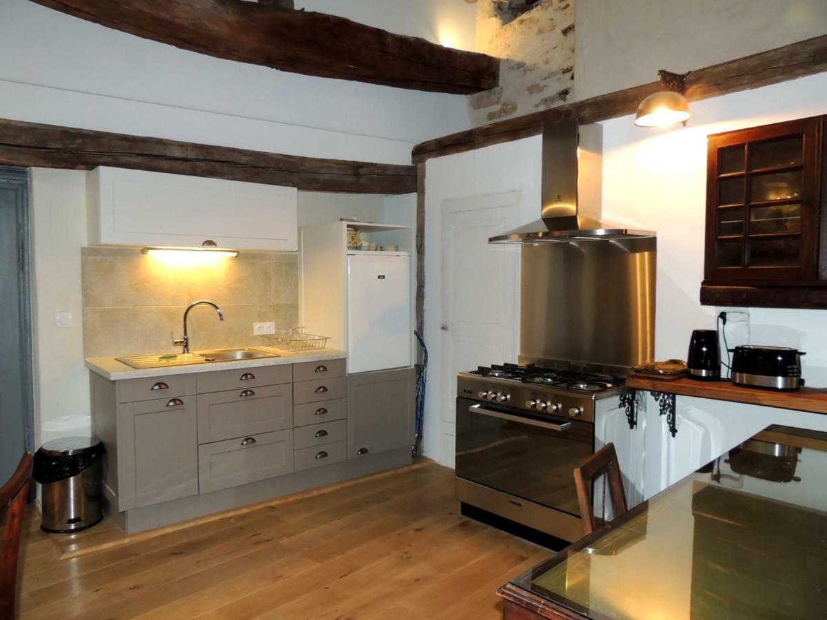 Maison Romane 1136 Cluny Bagian luar foto