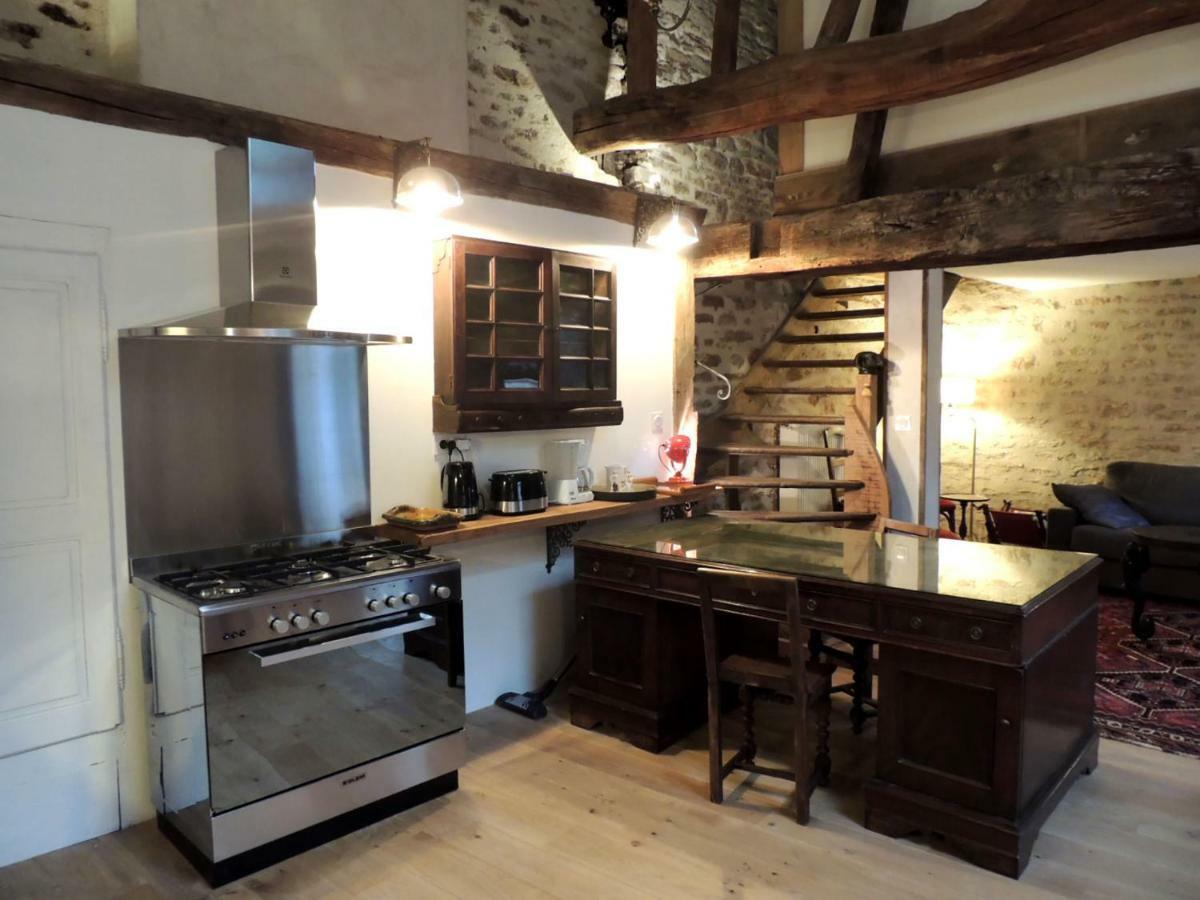 Maison Romane 1136 Cluny Bagian luar foto